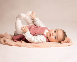 Cute little girl at a six month sitter session in Gatehead